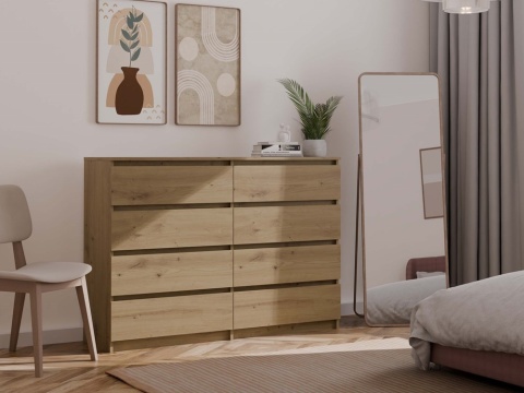 Stylowe wnętrze pokoju dziennego z komodą dąb artisan KOM-908-ART w półprofilu.