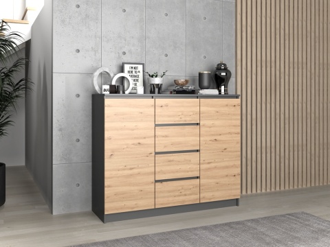 Stylowe wnętrze sypialni z funkcjonalną komodą antracyt artisan KOM-913-ANT-ART w półprofilu.