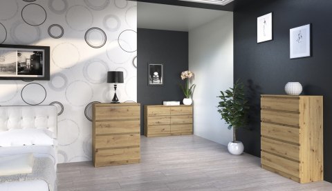 Piękny dekor dębu artisan frontów komody KOM-901-ART w blasku słońca, podkreślający słoje i bezproblemowe utrzymanie czystości.