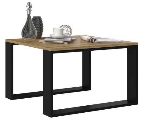 Bryła mini stolika w półprofilu – dąb artisan i czerń z zaaranżowanym blatem.