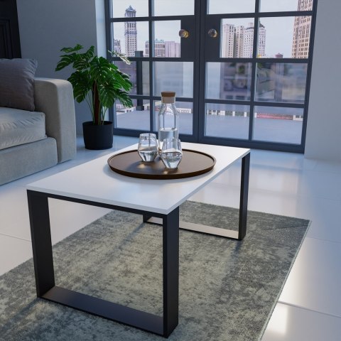 Stolik STOL-802-BIEL-CZERN w aranżacji salonu jako minimalistyczny  dodatek – widok boczny.