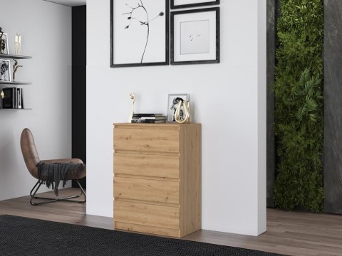 Stylowe wnętrze nowoczesnego pokoju z komodą dąb artisan KOM-902-ART w półprofilu.