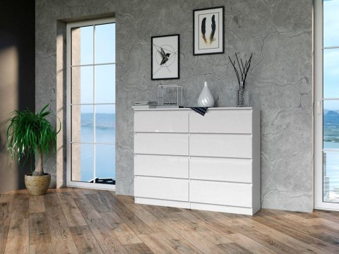 Wizualizacja nowoczesnego, jasnego salonu z szeroką komodą 120 cm w białym połysku KOM-907-BIEL-POŁ.