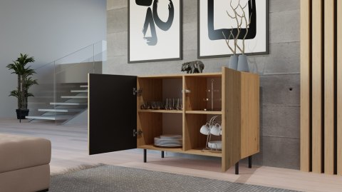Komoda KOM-922-ART-LAM z otwartymi drzwiczkami w codziennym użytkowaniu – przechowywanie odzieży i domowych tekstyliów.