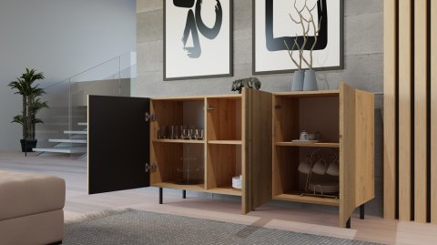 Komoda KOM-924-ART-LAM z otwartymi drzwiczkami w codziennym użytkowaniu – przechowywanie odzieży i tekstyliów.