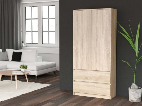 Stylowe wnętrze z funkcjonalną szafą 90cm SZAF-1008-SON w półprofilu.
